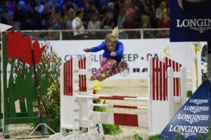 Event Planning image of girl jumping over horse jump